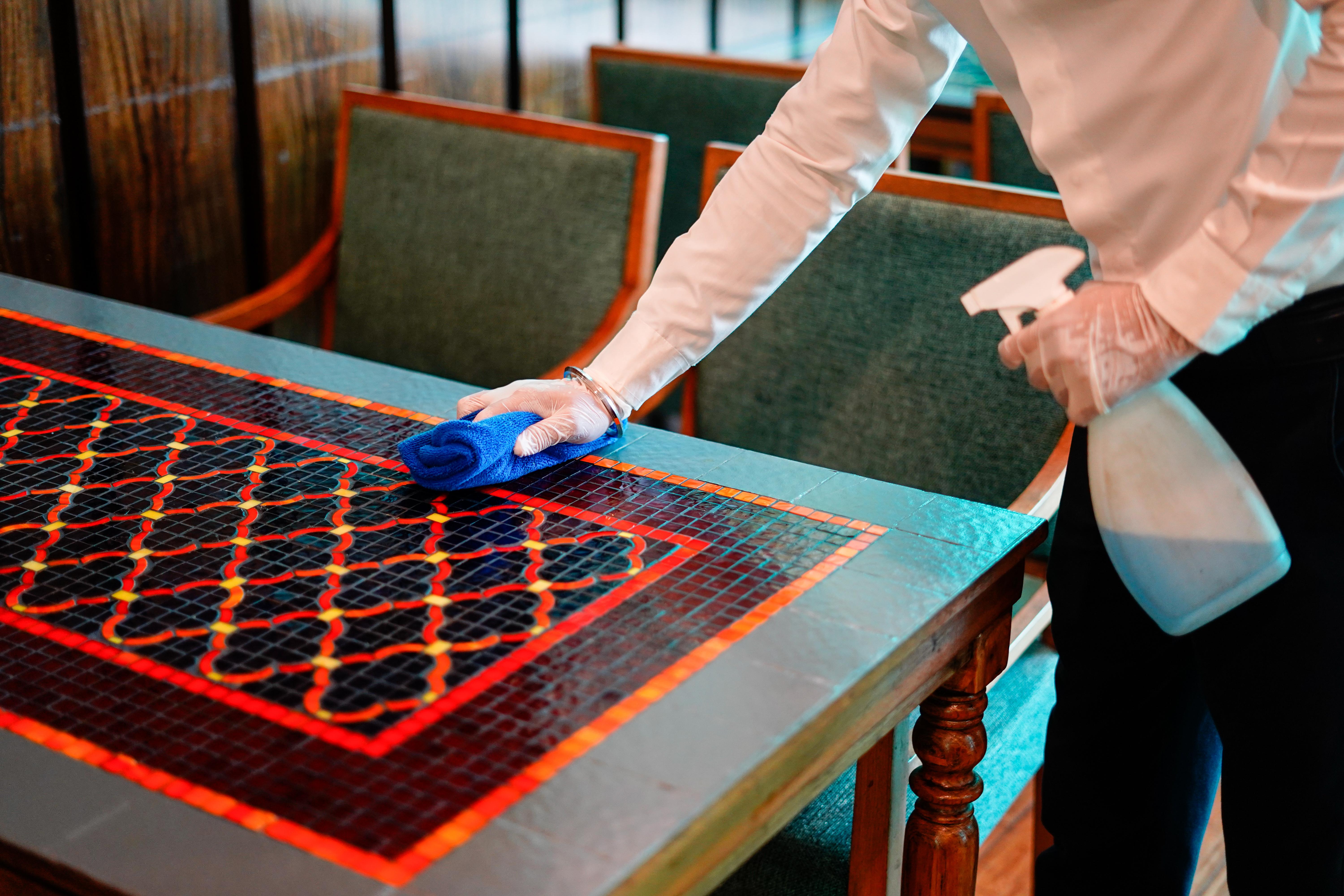 Novotel Goa Resort & Spa Кандолим Екстериор снимка A hotel housekeeper wiping down a table